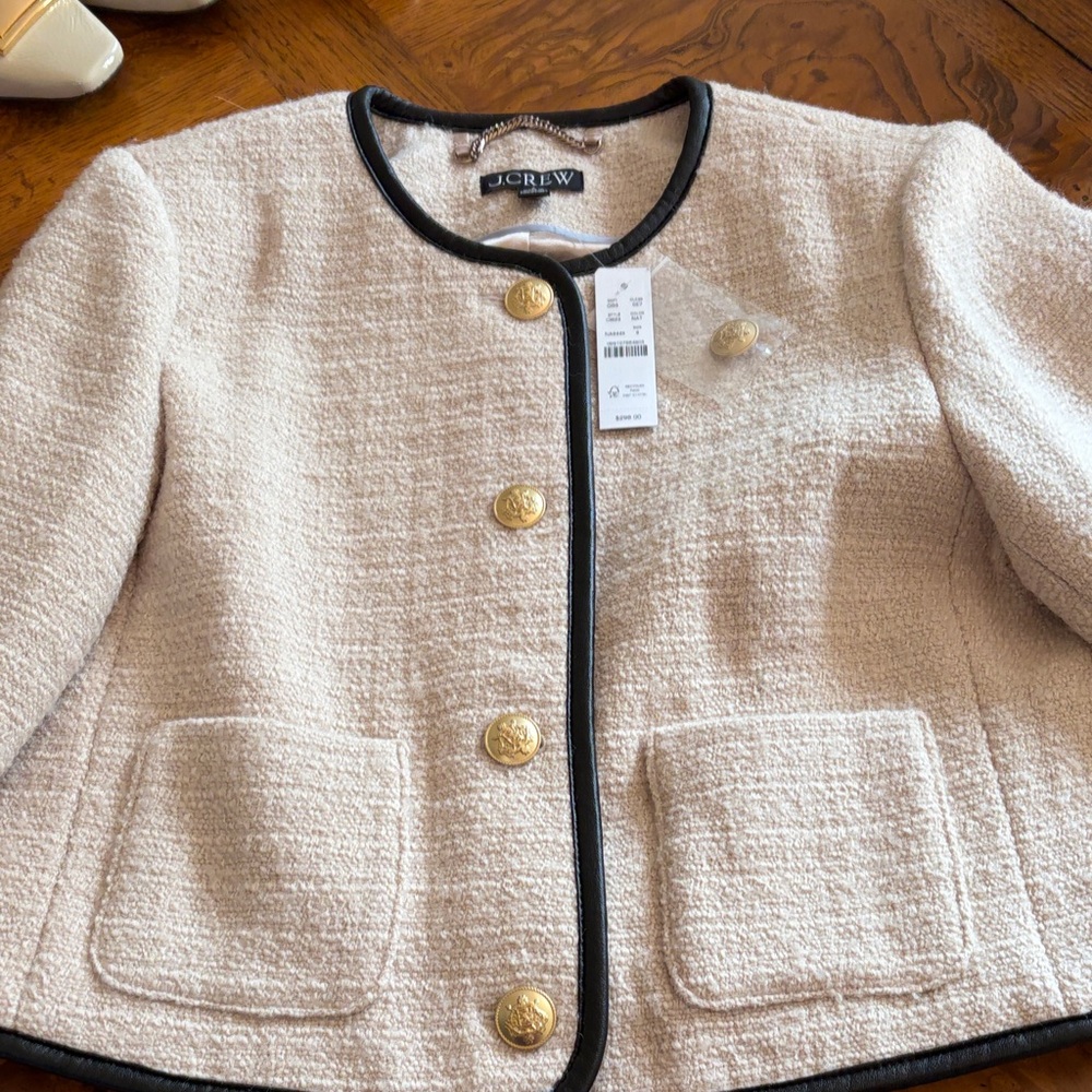 J. Crew Cream  tweed blazer with black faux leather piping. Size 8.